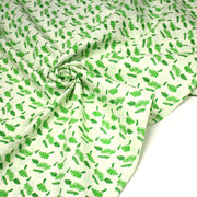 Tissu popeline coton écru aux fougères et feuilles tropicales vertes - tissuspipi.com