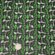 Tissu popeline coton noir aux fougères et feuilles tropicales vertes - tissuspipi.com