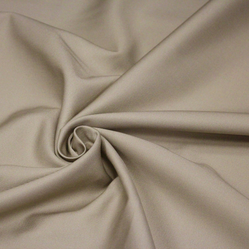 Tissu gabardine polycoton couleur beige sable trench 275gr/m2 - tissuspipi.com
