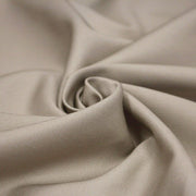Tissu gabardine polycoton couleur beige sable trench 275gr/m2 - tissuspipi.com
