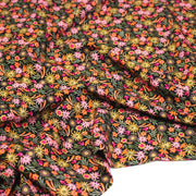 Tissu Viscose fluide JOLI petit fleuri rose ocre vert fond noir – STANDARD 100 OEKO - TEX - tissuspipi.com
