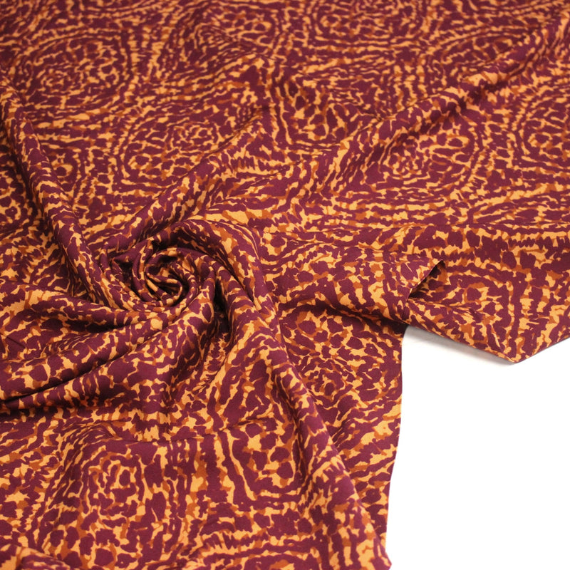 Tissu Viscose fluide ASSA arabesques rouge bordeaux fond ocre – STANDARD 100 OEKO - TEX - tissuspipi.com