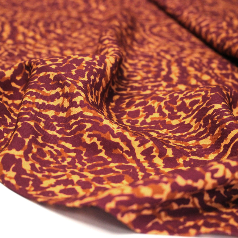 Tissu Viscose fluide ASSA arabesques rouge bordeaux fond ocre – STANDARD 100 OEKO - TEX - tissuspipi.com