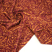Tissu Viscose fluide ASSA arabesques rouge bordeaux fond ocre – STANDARD 100 OEKO - TEX - tissuspipi.com