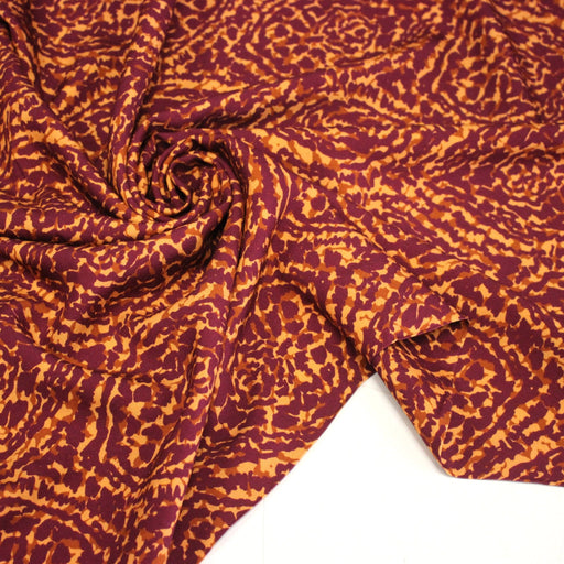 Tissu Viscose fluide ASSA arabesques rouge bordeaux fond ocre – STANDARD 100 OEKO - TEX - tissuspipi.com