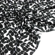 Tissu viscose fluide SEVENTIES, motif géométrique noir et blanc - STANDARD 100 OEKO - TEX - tissuspipi.com
