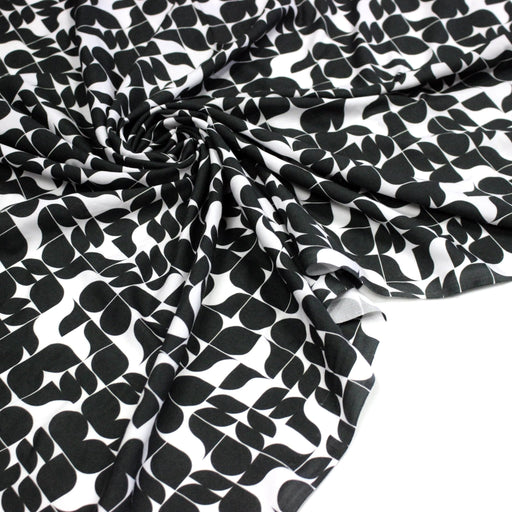Tissu viscose fluide SEVENTIES, motif géométrique noir et blanc - STANDARD 100 OEKO - TEX - tissuspipi.com