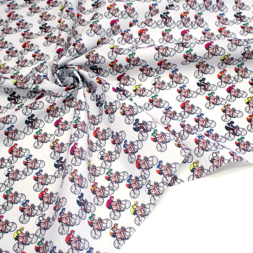 Tissu cotonnade Les petits cyclistes aux vélos & tenues colorées - OEKO - TEX STANDARD 100 - tissuspipi.com