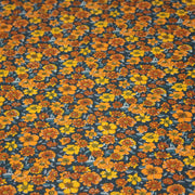 Tissu cotonnade motif fleuri bleu canard & jaune orange - OEKO - TEX STANDARD 100 - tissuspipi.com