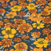 Tissu cotonnade motif fleuri bleu canard & jaune orange - OEKO - TEX STANDARD 100 - tissuspipi.com