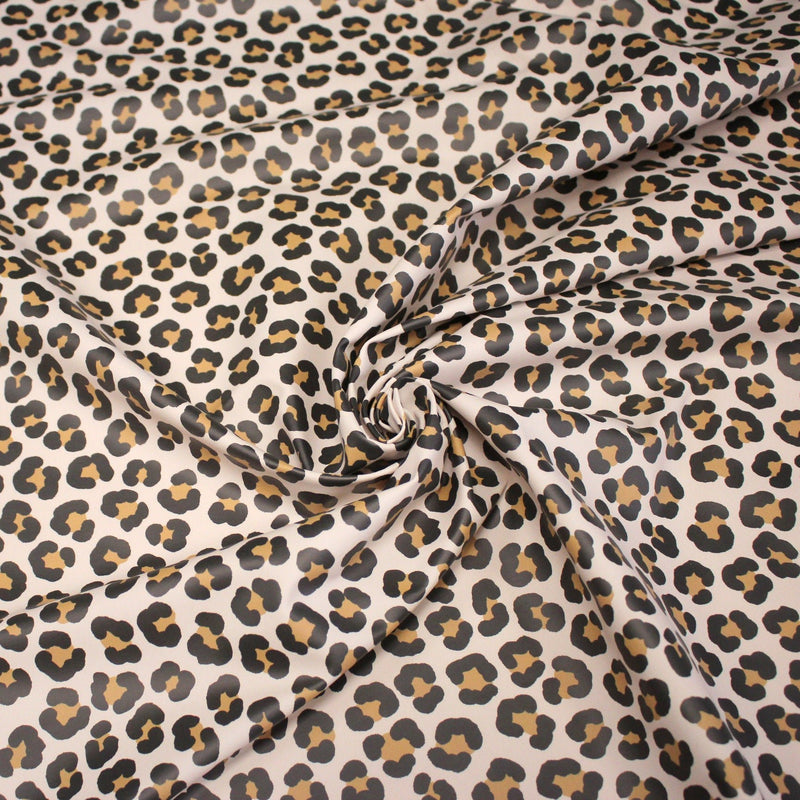 Tissu habillement imperméable, imprimé motif LEOPARD - tissuspipi.com