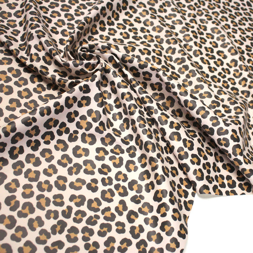 Tissu habillement imperméable, imprimé motif LEOPARD - tissuspipi.com