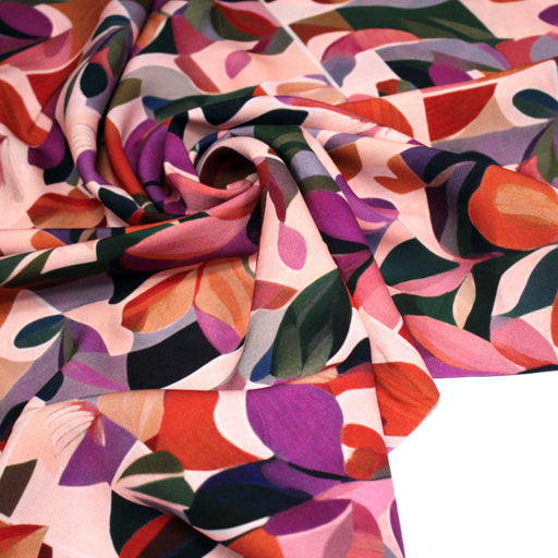 Tissu Viscose fluide rose aux pétales multicolores, NAWEL - STANDARD 100 OEKO - TEX - tissuspipi.com