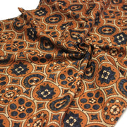 Tissu coton fin imprimé INDIENNES, cercles, fleurs et formes, fond ocre - STANDARD 100 OEKO - TEX - tissuspipi.com