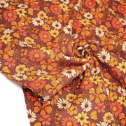 Tissu velours milleraies imprimé Seventies, fleuri rouille & orange - STANDARD 100 OEKO - TEX - tissuspipi.com