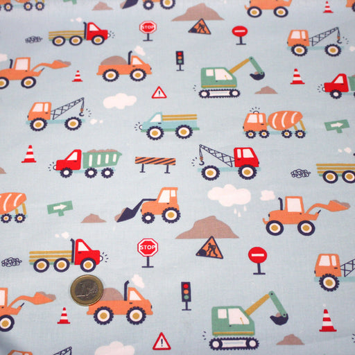Tissu cotonnade enfant bleu aux grues, camions et tracteurs - STANDARD 100 OEKO - TEX - tissuspipi.com