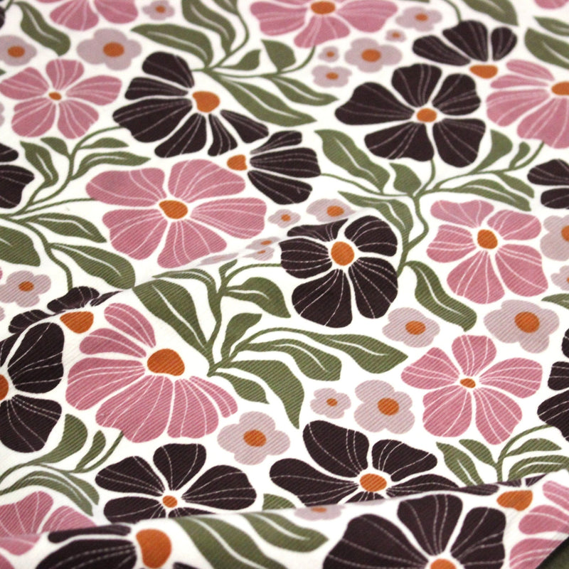 Tissu velours milleraies imprimé SEVENTIES, fleuri rose & aubergine, feuilles vertes - STANDARD 100 OEKO - TEX - tissuspipi.com