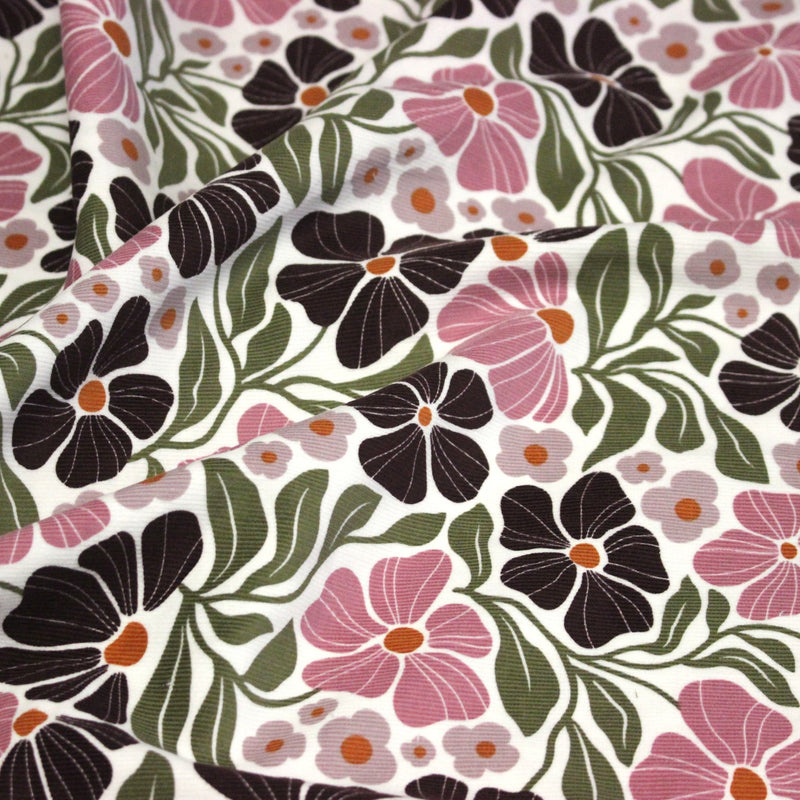 Tissu velours milleraies imprimé SEVENTIES, fleuri rose & aubergine, feuilles vertes - STANDARD 100 OEKO - TEX - tissuspipi.com