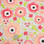 Tissu cotonnade aux belles fleurs roses graphiques sur fond blanc pois noirs - COLLECTION ÉTÉ - tissuspipi.com