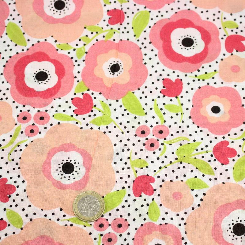 Tissu cotonnade aux belles fleurs roses graphiques sur fond blanc pois noirs - COLLECTION ÉTÉ - tissuspipi.com