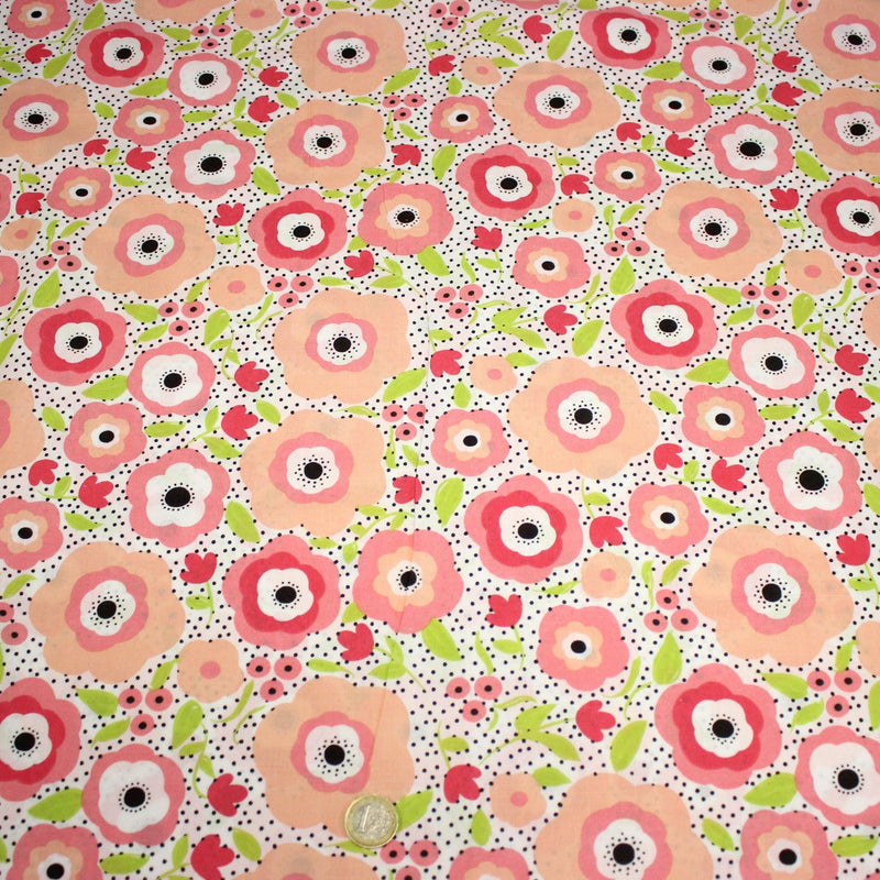Tissu cotonnade aux belles fleurs roses graphiques sur fond blanc pois noirs - COLLECTION ÉTÉ - tissuspipi.com
