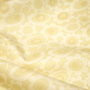 Tissu cotonnade jaune aux fleurs stylisées 70s jaunes - COLLECTION SEVENTIES - tissuspipi.com