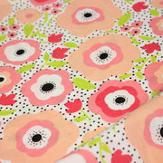 Tissu cotonnade aux belles fleurs roses graphiques sur fond blanc pois noirs - COLLECTION ÉTÉ - tissuspipi.com