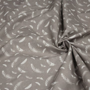 Tissu cotonnade gris clair aux plumes blanches - OEKO - TEX - tissuspipi.com