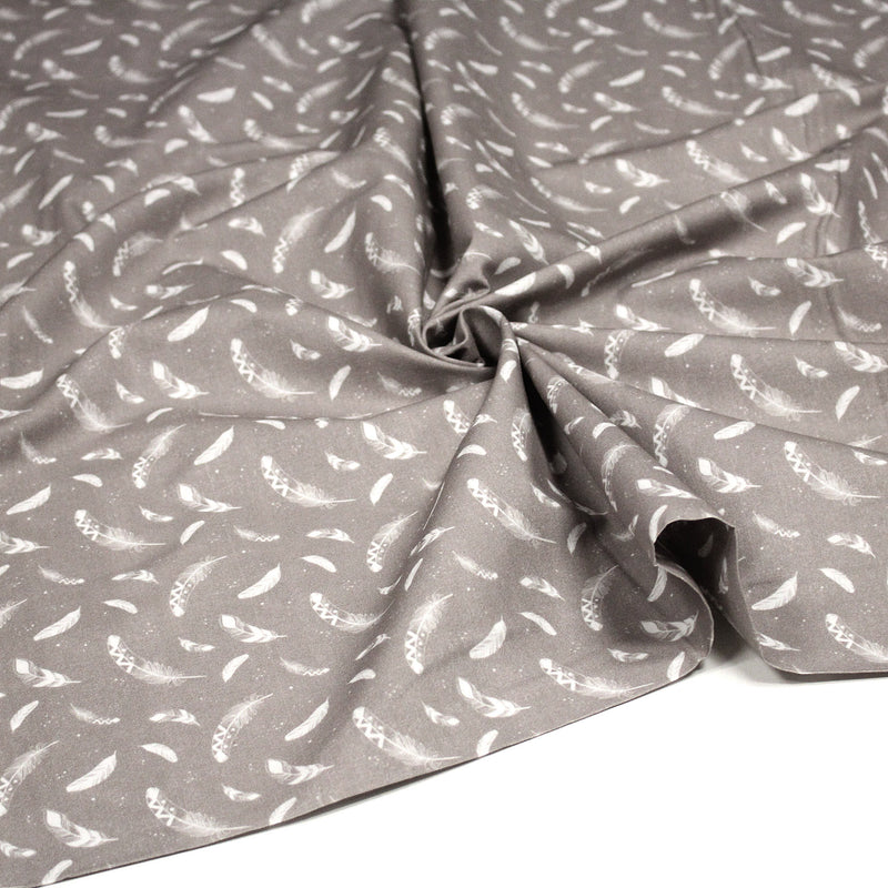 Tissu cotonnade gris clair aux plumes blanches - OEKO - TEX - tissuspipi.com