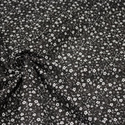 Tissu cotonnade noir aux fleurs blanches - OEKO - TEX - tissuspipi.com