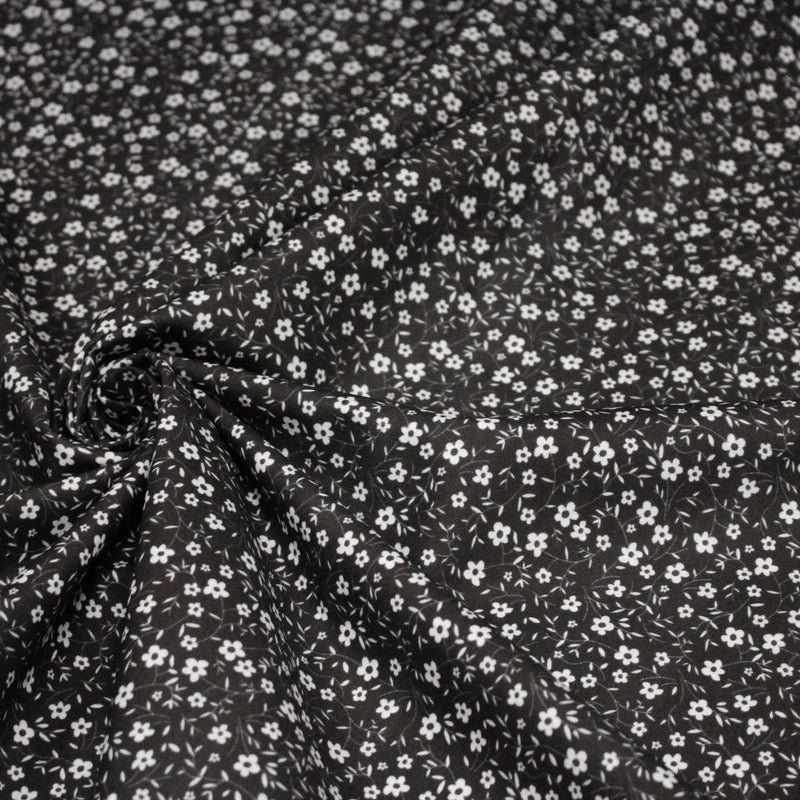 Tissu cotonnade noir aux fleurs blanches - OEKO - TEX - tissuspipi.com