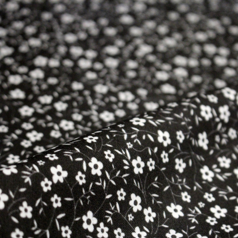 Tissu cotonnade noir aux fleurs blanches - OEKO - TEX - tissuspipi.com