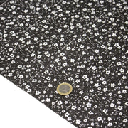 Tissu cotonnade noir aux fleurs blanches - OEKO - TEX - tissuspipi.com