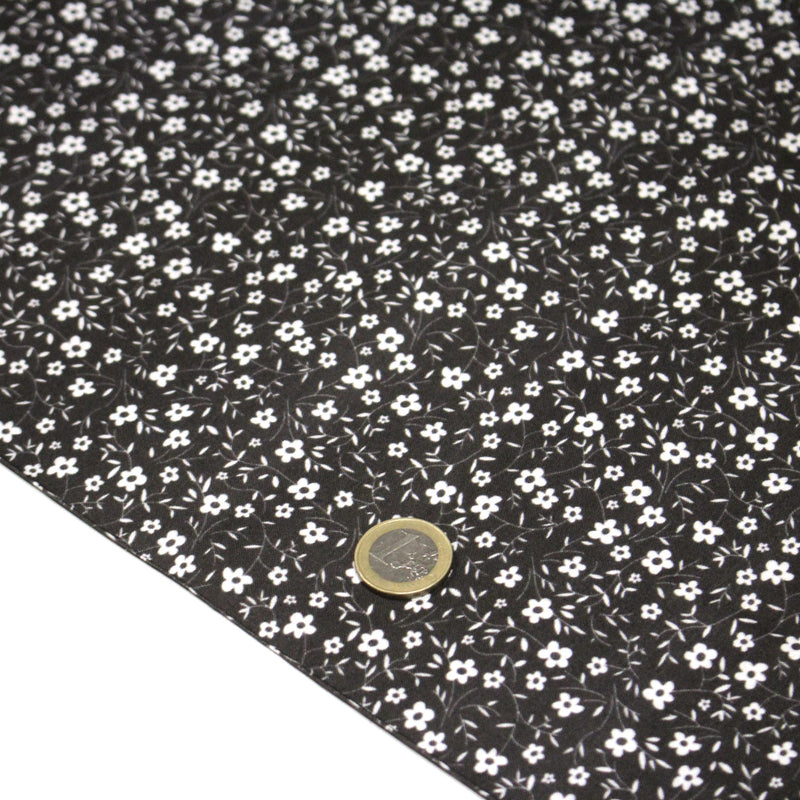 Tissu cotonnade noir aux fleurs blanches - OEKO - TEX - tissuspipi.com
