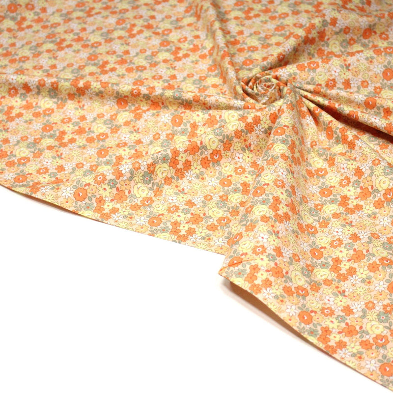Tissu popeline coton fleurie orange jaune vert fond orange - OEKO - TEX - tissuspipi.com
