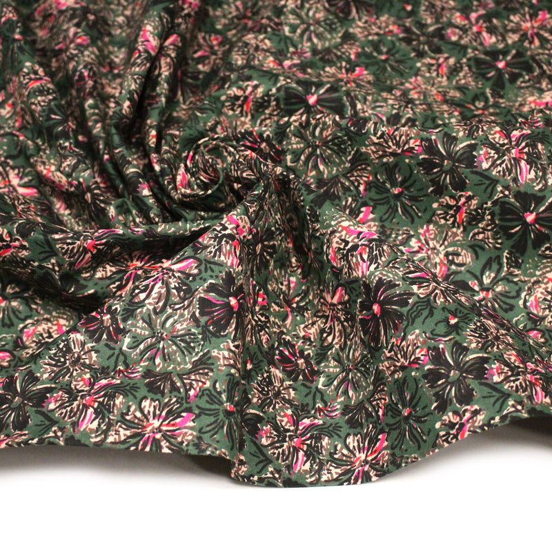 Tissu cotonnade ESTORIL fleuri vert aux touches noires, fuchsia et écrues - STANDARD 100 OEKO - TEX - tissuspipi.com