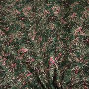 Tissu cotonnade ESTORIL fleuri vert aux touches noires, fuchsia et écrues - STANDARD 100 OEKO - TEX - tissuspipi.com