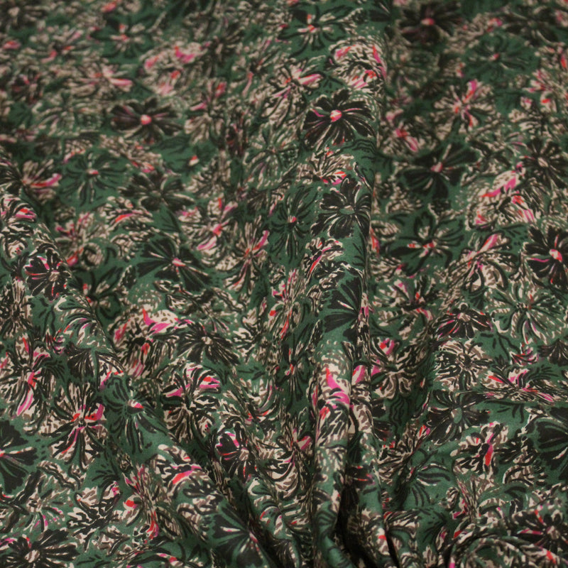 Tissu cotonnade ESTORIL fleuri vert aux touches noires, fuchsia et écrues - STANDARD 100 OEKO - TEX - tissuspipi.com