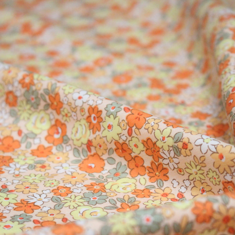Tissu popeline coton fleurie orange jaune vert fond orange - OEKO - TEX - tissuspipi.com