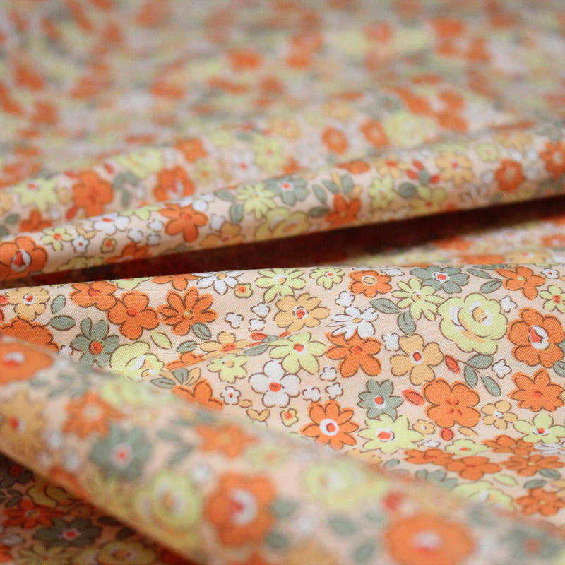 Tissu popeline coton fleurie orange jaune vert fond orange - OEKO - TEX - tissuspipi.com