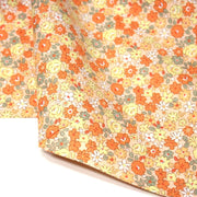 Tissu popeline coton fleurie orange jaune vert fond orange - OEKO - TEX - tissuspipi.com