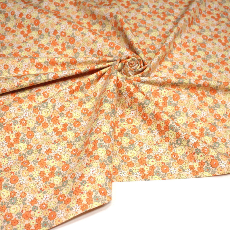 Tissu popeline coton fleurie orange jaune vert fond orange - OEKO - TEX - tissuspipi.com