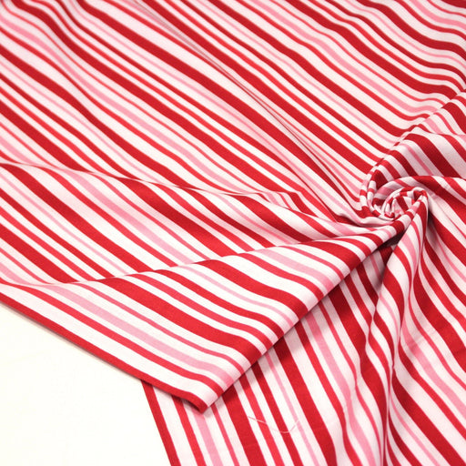 Tissu cotonnade aux rayures rouges, roses et blanches - tissuspipi.com