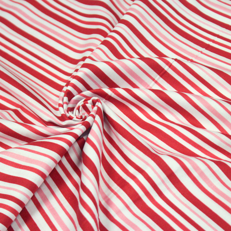 Tissu cotonnade aux rayures rouges, roses et blanches - tissuspipi.com