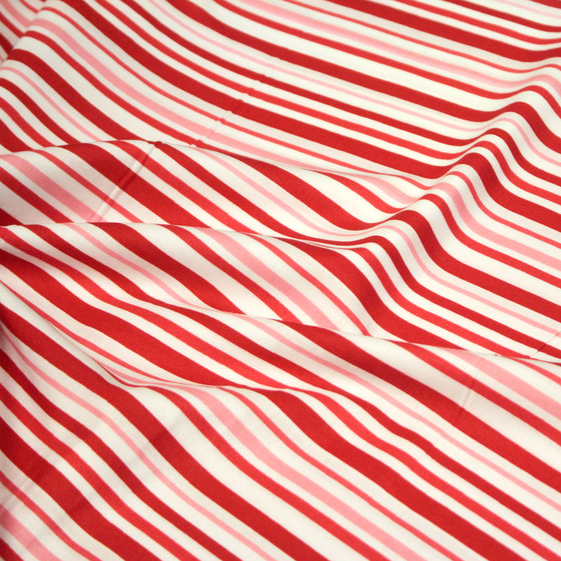 Tissu cotonnade aux rayures rouges, roses et blanches - tissuspipi.com