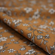 Tissu popeline coton ocre aux fines fleurs écrues & noires - OEKO - TEX - tissuspipi.com