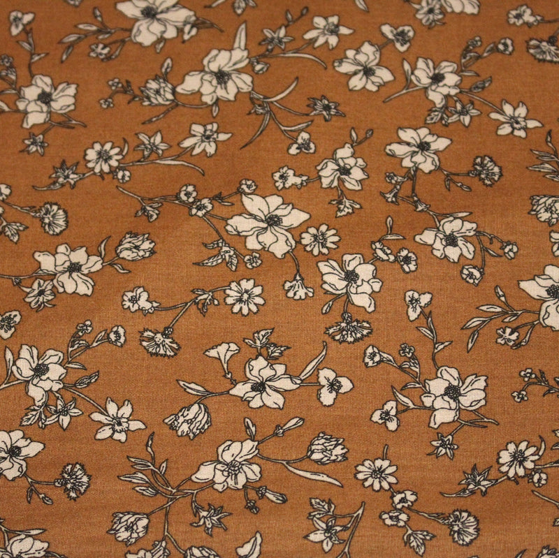 Tissu popeline coton ocre aux fines fleurs écrues & noires - OEKO - TEX - tissuspipi.com