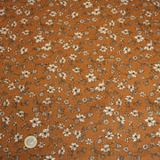 Tissu popeline coton ocre aux fines fleurs écrues & noires - OEKO - TEX - tissuspipi.com
