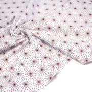 Tissu de Noël cotonnade aux étoiles vertes et rouges, fond blanc - tissuspipi.com