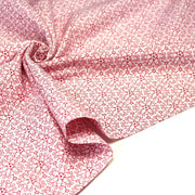 Tissu de Noël cotonnade blanc aux motifs géométriques rouges de Noël - tissuspipi.com